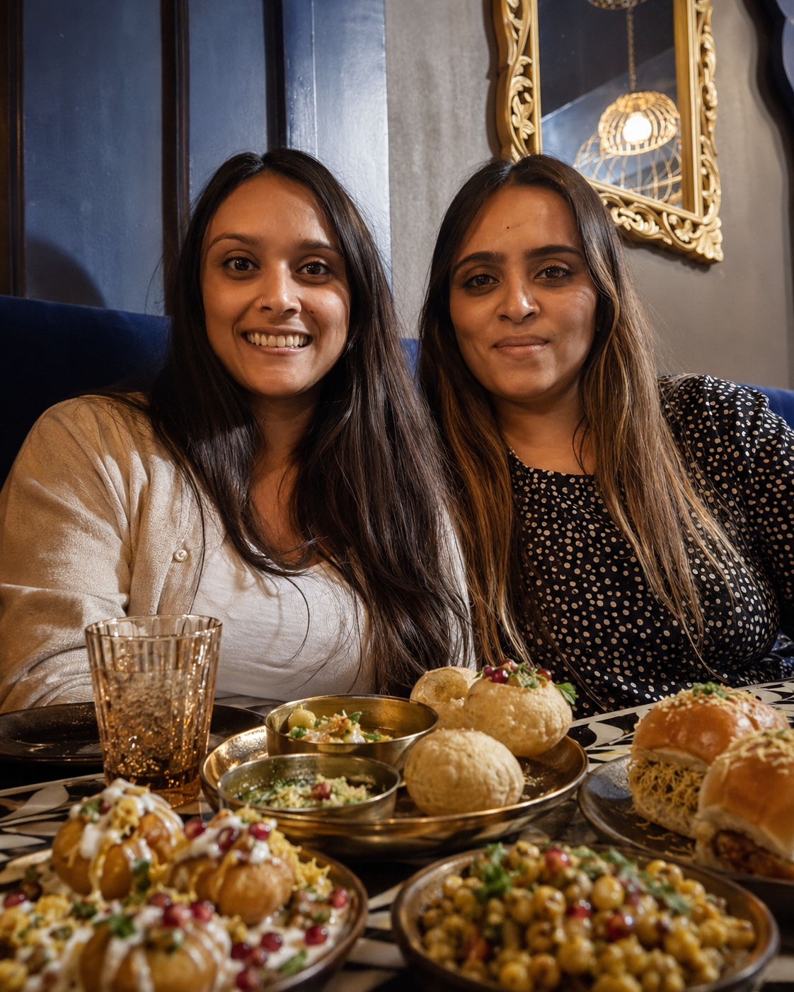 The Rock Paper Sisters founders at their table